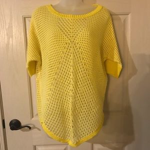 Yellow open weave sweater.